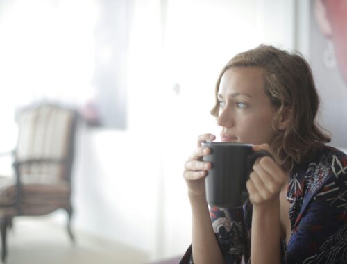 Etsy Seller, contemplative, sipping tea